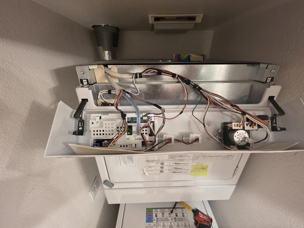 Appliance internals opened up on a service call