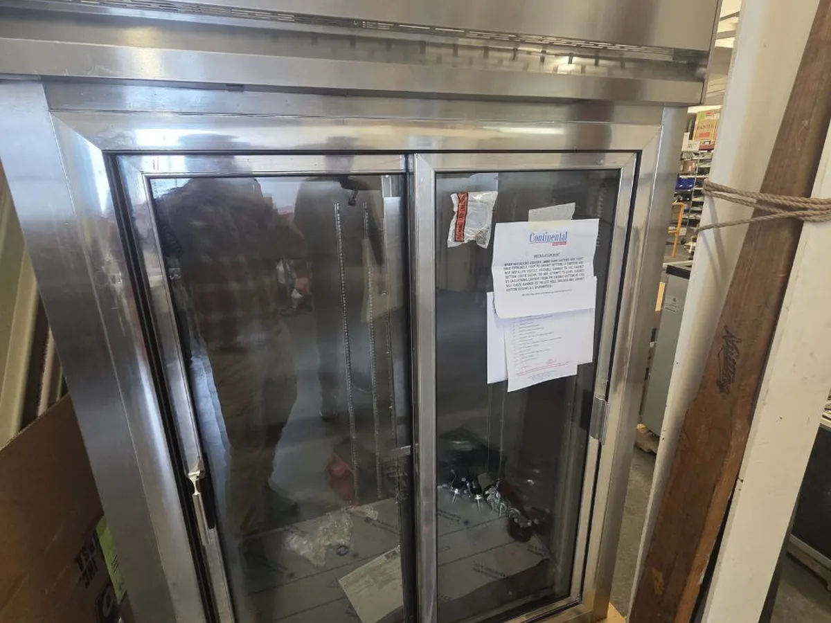 Glass-door commercial reach-in refrigerator serviced by VOLT8