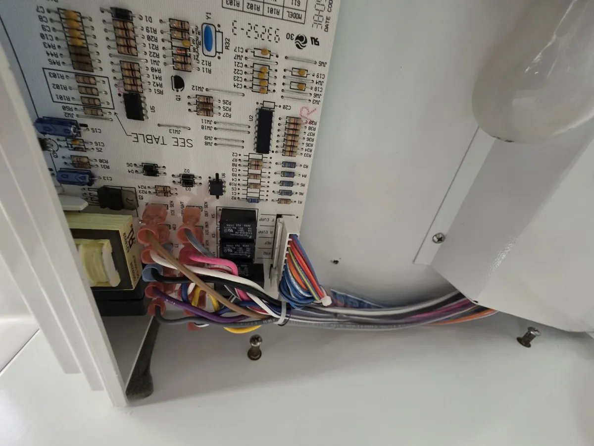Appliance control board and wiring during diagnosis