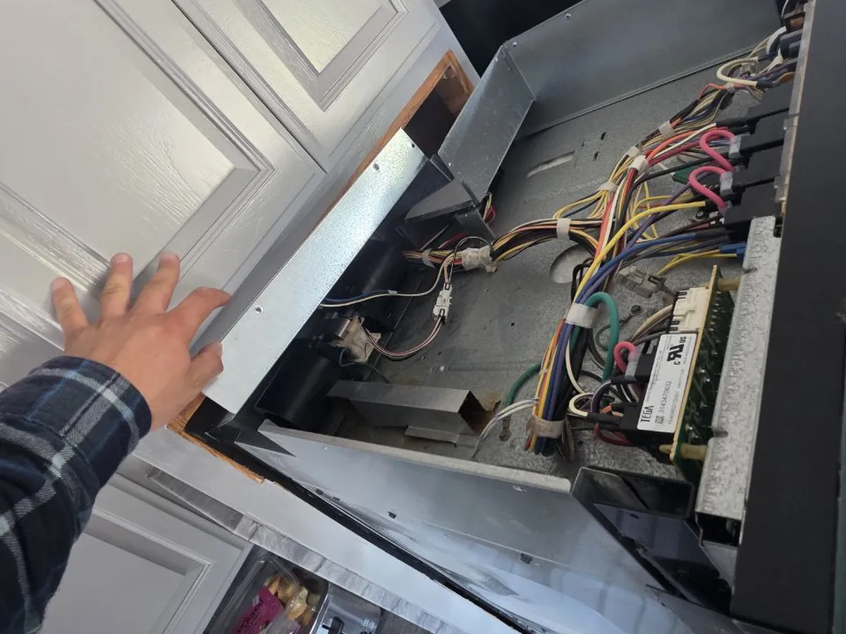 Appliance service panel opened up on a Bay Area call