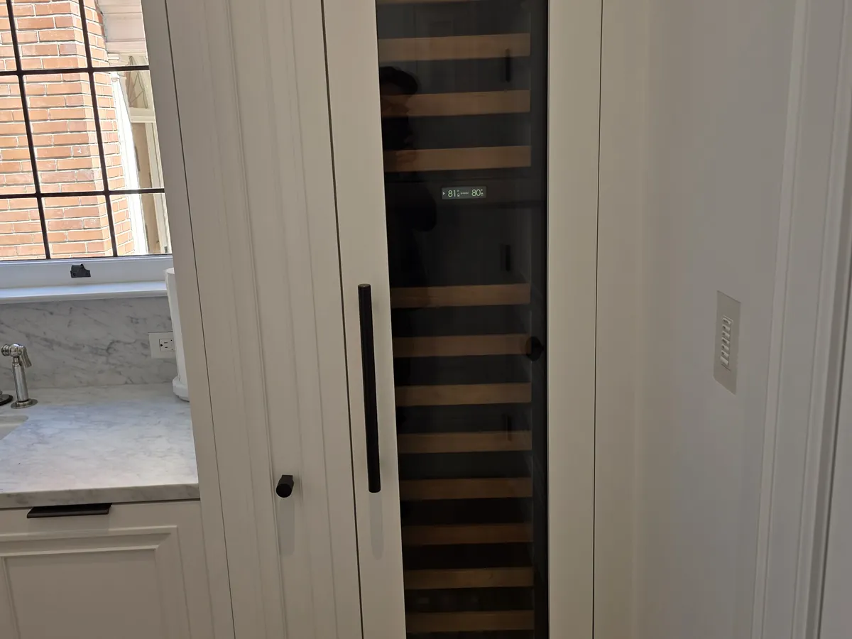 Sub-Zero wine storage unit built into cabinetry